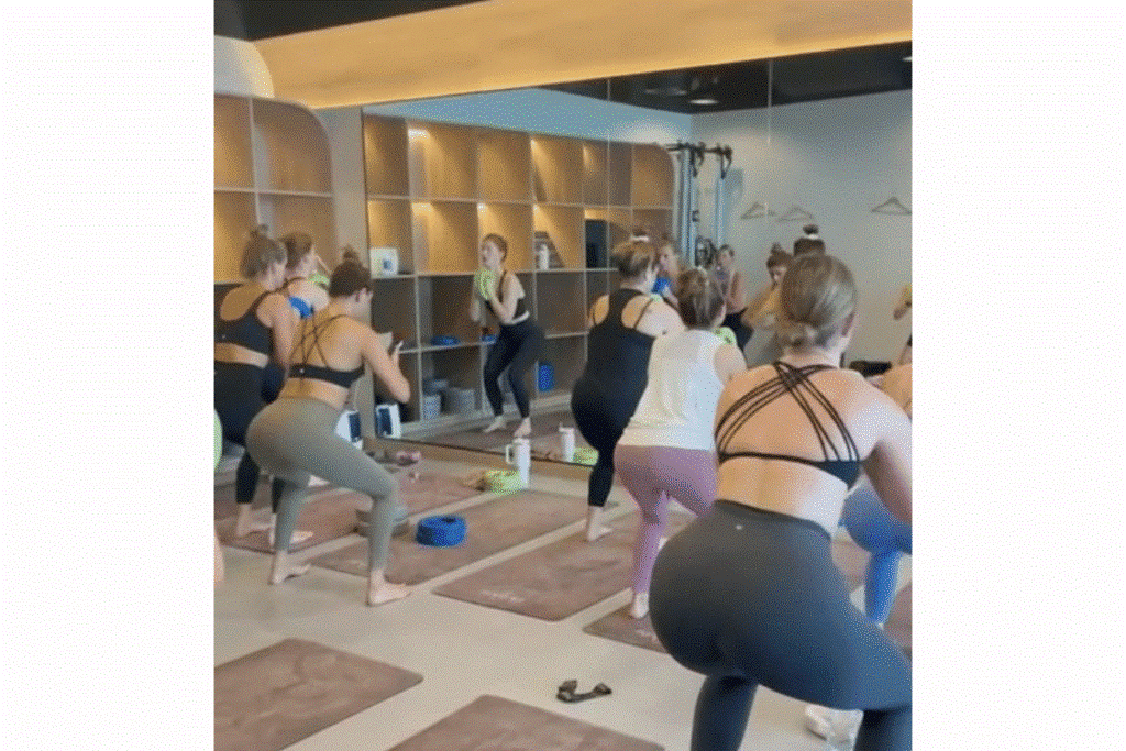 Instructor guiding Pilates breathing exercise at Antara Yoga Pilates Abu Dhabi